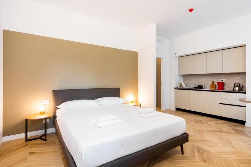 Kuchyň nebo kuchyňský kout v ubytování JOIVY Premium Apartments - Trieste Mazzini