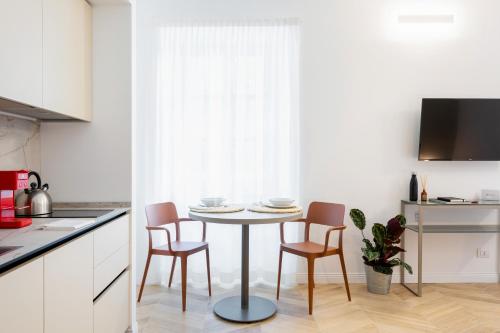 Kuchyň nebo kuchyňský kout v ubytování JOIVY Premium Apartments - Trieste Mazzini