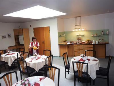 Restaurant o un lloc per menjar a Pension an der Weisseritz