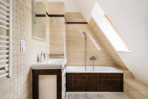 Kúpeľňa v ubytovaní Apartamenty Domino - Kościelisko