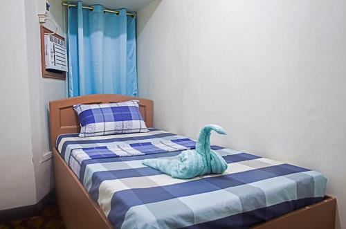 Postel nebo postele na pokoji v ubytování Providence Travellers Inn & Spa