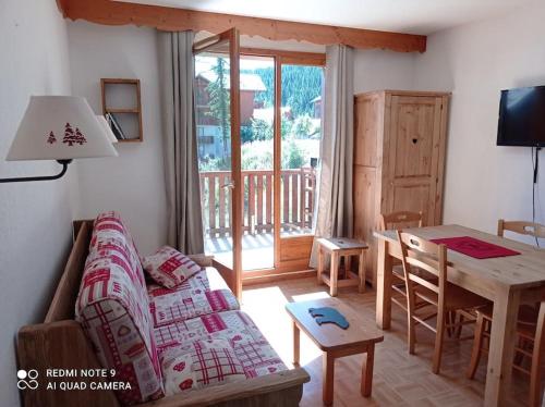 Istumisnurk majutusasutuses APPARTEMENT COSY 5 PERSONNES PRES DES PISTES