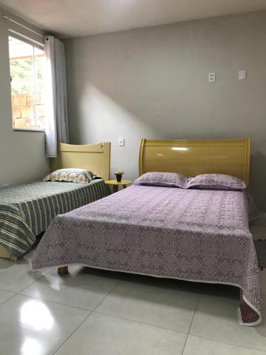 Posteľ alebo postele v izbe v ubytovaní Apartamento Fruto da Terra 301 VISTA PANORÂMICA MONTANHAS