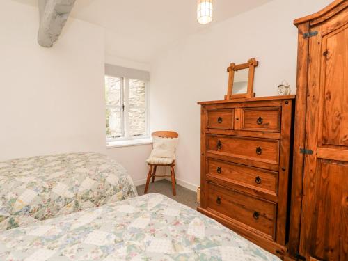 Postelja oz. postelje v sobi nastanitve Beckfold Cottage