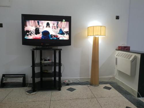 A television and/or entertainment center at GHALI House