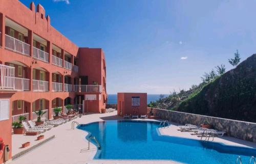 The swimming pool at or close to Apartamento Mi casa tu casa