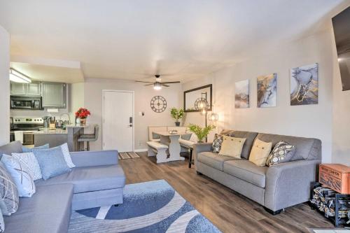 a living room with two couches and a kitchen at Sweet Skiers Escape Less Than Half-Mile to the Slopes! in Brian Head