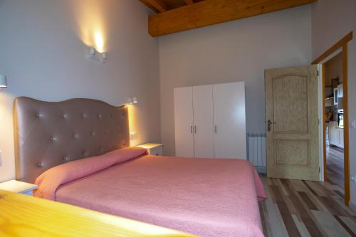 Postel nebo postele na pokoji v ubytování Apartamentos Rurales Miramar