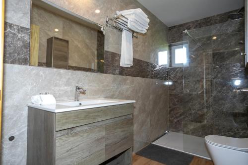 Koupelna v ubytování Apartamentos Rurales Miramar
