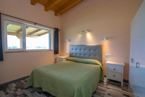 Postel nebo postele na pokoji v ubytování Apartamentos Rurales Miramar
