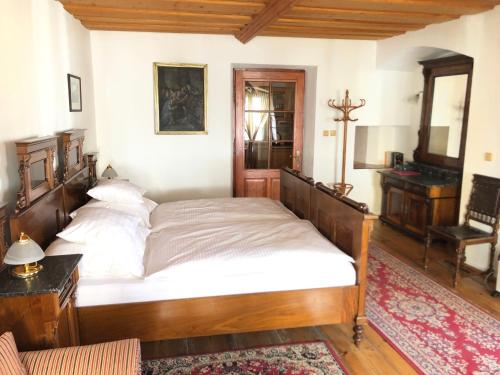 Postel nebo postele na pokoji v ubytování Apartmány pod věží