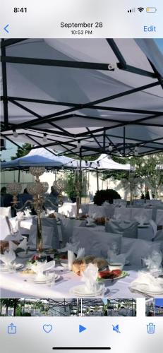 a picture of a table with plates of food at Europa Hotel-Kutaisi in Kutaisi
