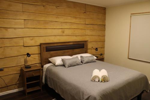 Ein Bett oder Betten in einem Zimmer der Unterkunft APART HOME COSTANERA