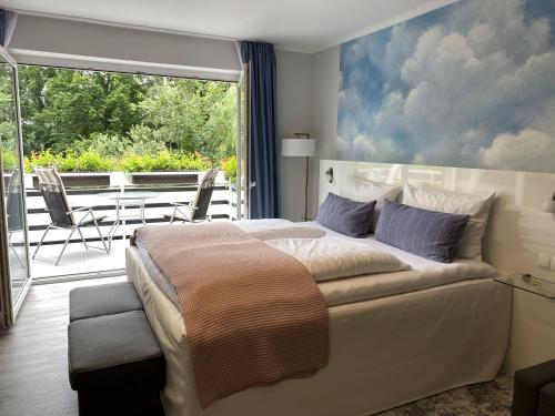 Katil atau katil-katil dalam bilik di Hotel zur Bever