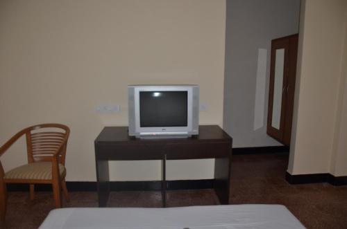 TV a/nebo společenská místnost v ubytování Hotel Ferreira Resort