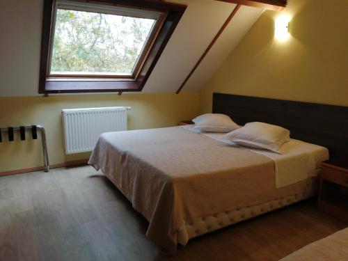 Postel nebo postele na pokoji v ubytování Hotel In Den Hoek