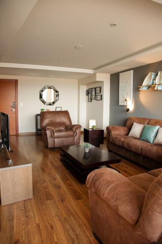 Χώρος καθιστικού στο Wanderlot - Departamento Leganza - Penthouse Lujoso