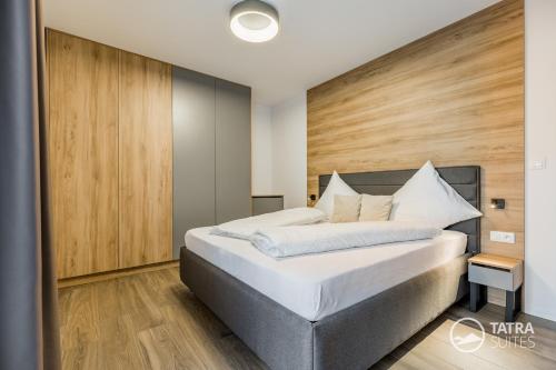 Postel nebo postele na pokoji v ubytování TATRA SUITES Cosy Apartment A26