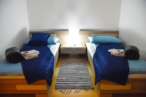 Postel nebo postele na pokoji v ubytování CIRIĆ APARTMANI
