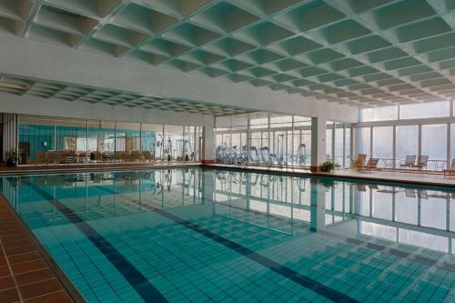 a swimming pool on the top of a building at Radisson Blu Resort, Beitostølen in Beitostøl