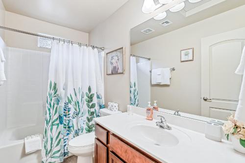 a bathroom with a sink and a toilet and a shower at Desert Love in Flagstaff