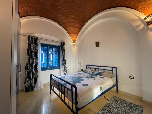 a bedroom with a bed in a room at Luxury Villa with pool in Hurghada in Hurghada