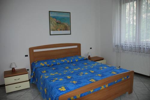 Кровать или кровати в номере Appartamenti Stanga Ivo
