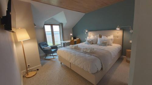 Postel nebo postele na pokoji v ubytování B&B Entre Champs