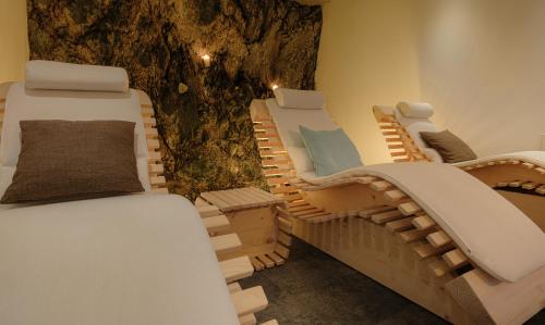 Hotel Bella Vista Zermattにあるベッド