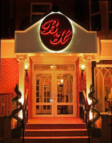Ein Zertifikat, Auszeichnung, Logo oder anderes Dokument, das in der Unterkunft Bedford Hotel ausgestellt ist