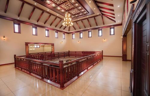 an empty altar in a church with an american flag at Wayanad Mace Mansion in Kenichira