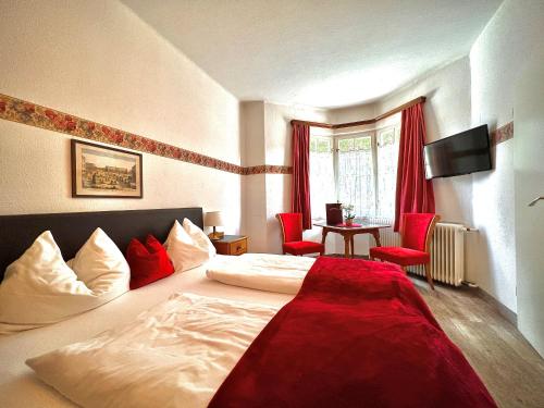 Llit o llits en una habitació de Hotel Grünwalderhof