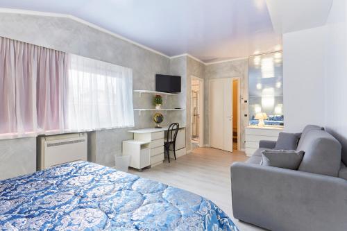 Postel nebo postele na pokoji v ubytování HOTEL Villa Lilla