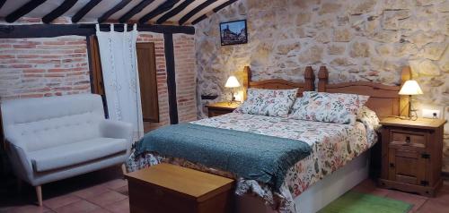 Posteľ alebo postele v izbe v ubytovaní Hotel La Casa Chacinera