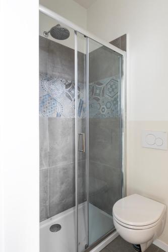 a bathroom with a shower and a toilet at Cute Studio in Old Town by Holiday Solutions in Como