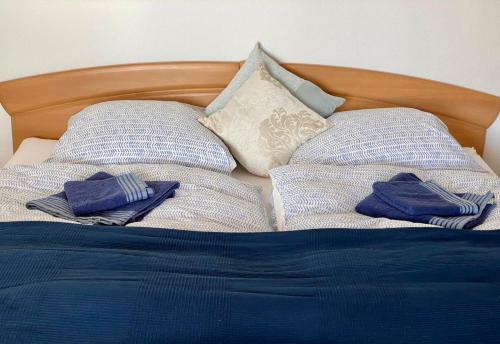 Łóżko lub łóżka w pokoju w obiekcie Ferienwohnung - Schöne Aussicht