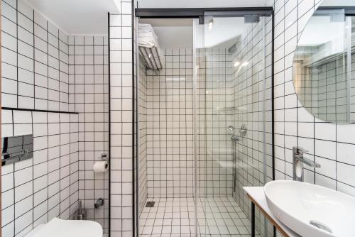 Kylpyhuone majoituspaikassa Urban Park Hotels