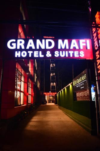 a sign that reads grand marlin hotel and suites at The Grand Mafi Hotel & Suites in Sylhet