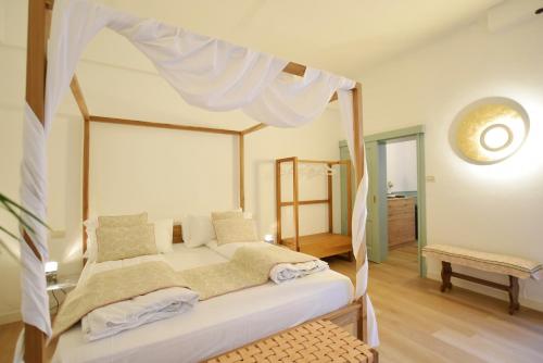เตียงในห้องที่ Isola Memmia