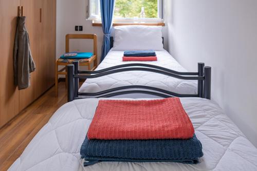 Letto o letti in una camera di Casa Angelo