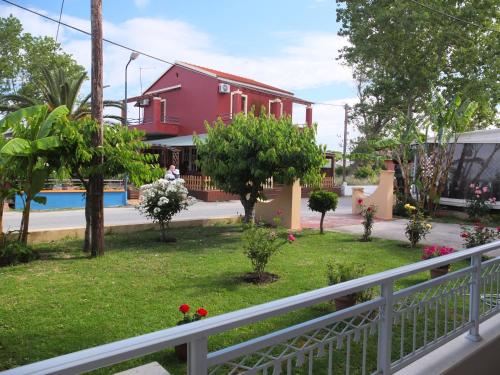 a view from the balcony of a house at Toula's Apartments in Sidari