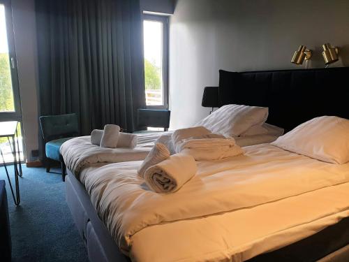 Säng eller sängar i ett rum på Treetop Spa Hangout & Hotel