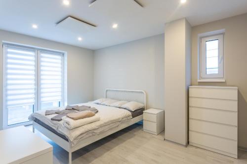 Postel nebo postele na pokoji v ubytování Ski Villa Rubicon