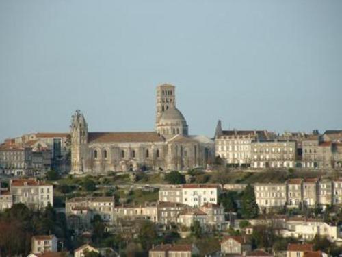a large building on top of a city at Hôtel des Pyrénées in Angoulême