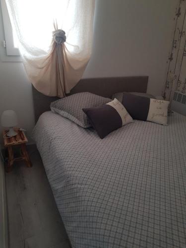 Postel nebo postele na pokoji v ubytování La Rose des Sables
