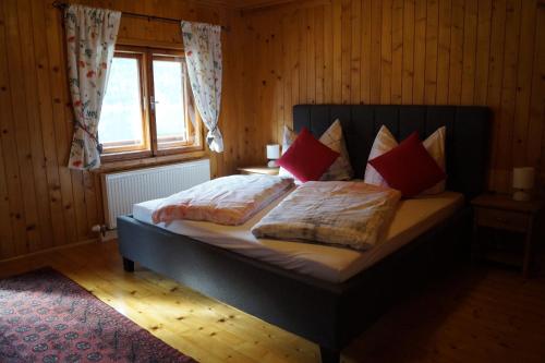 Un pat sau paturi într-o cameră la Ferienhaus Wille