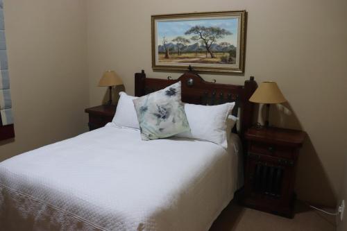 Tempat tidur dalam kamar di Kleine Kaap - Selfsorg
