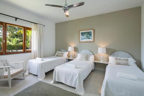 Cama o camas de una habitación en Hotel Punta Sur