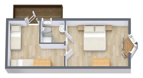 a floor plan of a room with a bedroom at Pension Garni Hochmoos in Lermoos