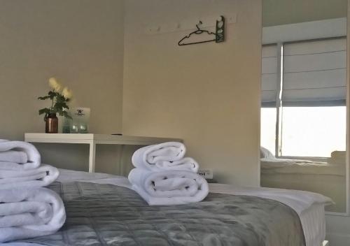 Postel nebo postele na pokoji v ubytování Kyivpasservis Hotel